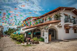 Colorful Bucerías street near homes Canadians buy as property in Mexico