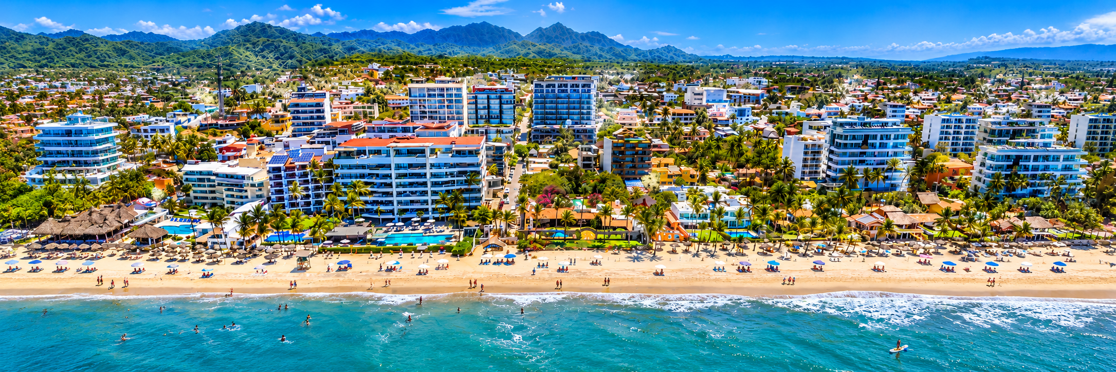 Aerial view of beachfront condos and the coastline in Bucerías, Nayarit, Mexico